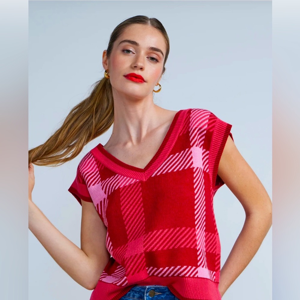 Ready for sweater weather? Cozy up on this sleeveless deep v neck plaid sweater